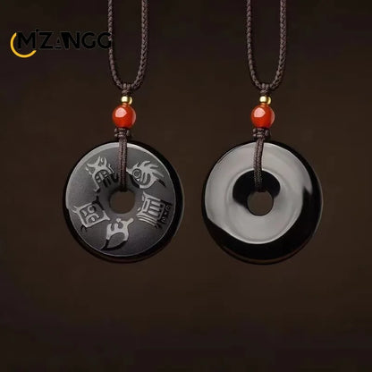 Colgante taoísta de obsidiana grabada