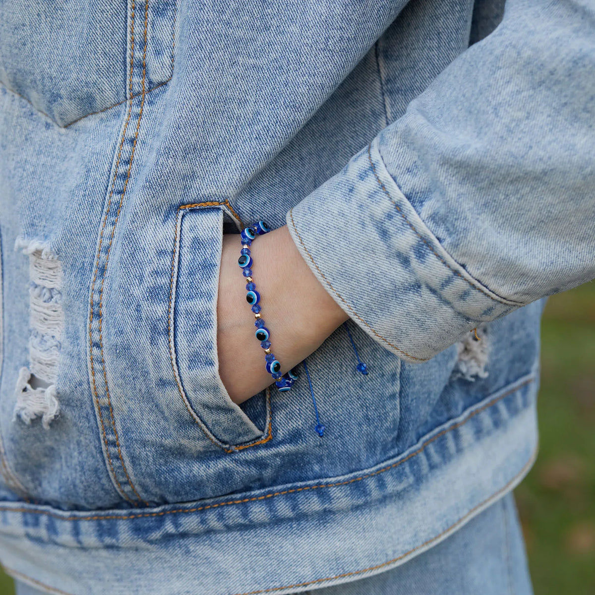 Pulsera trenzada de cristal con ojo turco