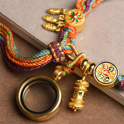 Pulsera Rueda de Oración · Cordón Multicolor